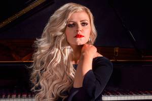 Sequim composer Jennifer Thomas' songs continue to be used by professional figure skaters, including three competitors at the 2021 World Figure Skating Championships in Stockholm, Sweden in late March. Her songs were a part of routines that helped Belgium, Japan and South Korea qualify spots at the 2022 Winter Olympics. Photo by Ron Southworth