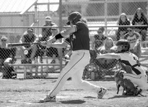 Eric Trent/The Chronicle
Forks’ Hayden Baker swings during a contest with Pe Ell-Willapa Valley on Friday.