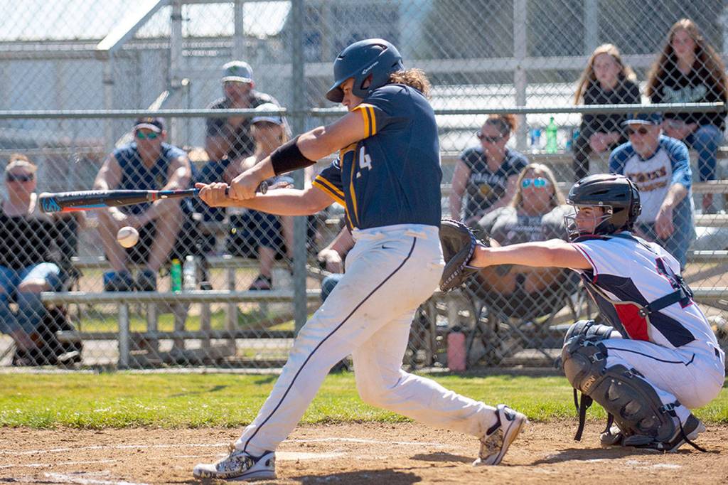 Eric Trent/The Chronicle
Forks’ Hayden Baker swings during a contest with Pe Ell-Willapa Valley on Friday.