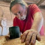 Carver Jewell James led the shaping of the nearly 25-foot totem pole that will be transported across the country this summer. The pole and its carvers will stop in Port Townsend on Saturday. (Photo courtesy of Freddie Lane Productions)