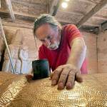 Carver Jewell James led the shaping of the nearly 25-foot totem pole that will be transported across the country this summer. The pole and its carvers will stop in Port Townsend on Saturday. (Photo courtesy of Freddie Lane Productions)