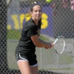 Keith Thorpe/Peninsula Daily News Sequims Kalli Wiker goes for the return in her match on Thursday against Port Angeles Liberty Lauer at Sequim High School.
