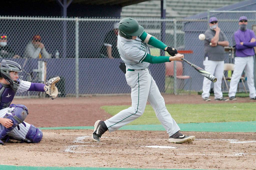 Kamron Meadows connects for one of his two hits against North Kitsap. (Mark Krulish/Kitsap News Group)