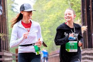 Port Angeles Marathon Association
Mother and daughter, Katie and Audrey Rudd of Port Angeles, run in the 5K Railroad Bridge Run on Saturday.