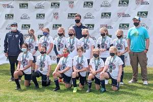 Photo courtesy of Jessica Lancaster 
From left, back row, coach Jay Marazon, Stella Fradkin, Madison Wilkinson, Emma Desjardin, Maddie Walton, assistant coach Rob Walton, Mariah Traband, Alayna Marazon, Lilly Lancaster, and assistant coach Jack Waknitz. From left, front row, Brooklynn Schmidt, Madigan Ordona, Emma Rhodes, Cela Waknitz, Lila Nix and Peyton Smith.