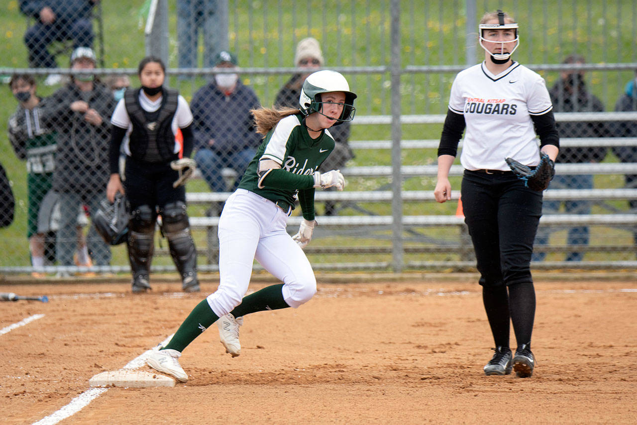 Port Angeles Zoe Smithson rounds first base against Central Kitsap. Smithson hit two home runs in Mondays 10-0 win and is batting .651 on the season. (Jesse Major/for Peninsula Daily News)