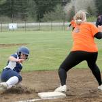 Forks Aspen Rondeau steals third against Napavine, Forks won 11-1 in district tournament play at Fred Orr Field in Beaver. (Lonnie Archibald/for Peninsula Daily News)
