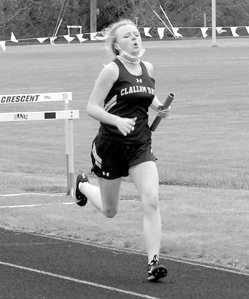 Keith Thorpe/Peninsula Daily News
Clallam Bay's Madison Pilatti sprints to the finish as anchor of her 4x200 relay team on Friday at Crescent High School.