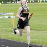 Keith Thorpe/Peninsula Daily News
Clallam Bay's Madison Pilatti sprints to the finish as anchor of her 4x200 relay team on Friday at Crescent High School.