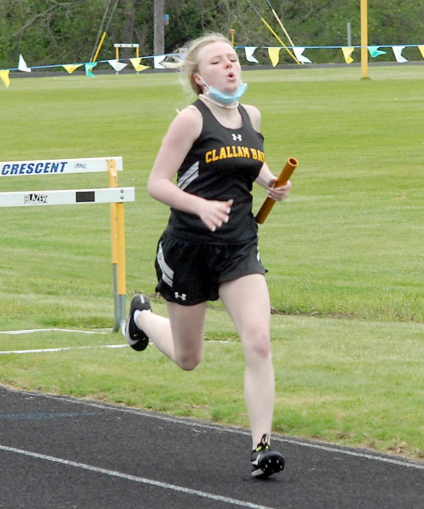 Keith Thorpe/Peninsula Daily News
Clallam Bay's Madison Pilatti sprints to the finish as anchor of her 4x200 relay team on Friday at Crescent High School.