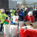 Keith Thorpe/Peninsula Daily News 

Participants in Saturday’s “Big Spring Spruce Up” pick up empty buckets for weeds and other organic waste before fanning out over downtown Port Angeles in an effort to clean up the city. A video is on the Peninsula Daily News website at cmg-northwest2.go-vip.net/peninsuladailynews.