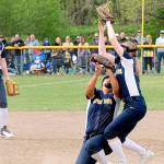 Lonnie Archibland/for the Peninsula Daily News
Spartan second baseman Kadie Wood makes the catch of an Adna fly ball for the out over shortstop Elizabeth Soto.  Forks placed second in district after falling to Adna 4-3 in extras innings.