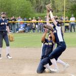 Spartan second baseman Kadie Wood makes the catch of an Adna fly ball for the out over shortstop Elizabeth Soto. Forks placed second in district after falling to Adna 4-3 in extras innings. (Lonnie Archibland/for Peninsula Daily News)