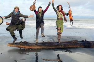 The band Three Wheels Turning -- from left, Aimée Ringle, Micaela Kingslight and Samara Jade -- will bring harmonies, strings and percussion to the Keg & I in Chimacum on Saturday. photo by Terry Du Beau