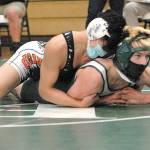 Keith Thorpe/Peninsula Daily News
Port Angeles' Jack Harrelson, front, takes on Central Kitsaps Shayne Hew-Len during Saturday's four-wat meet at Port Angeles High School.