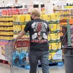 Mayor William Armacosts T-shirt worn during a recent shopping trip has been posted on a variety of Facebook sites. The PDN has blurred a profane word on the shirt. It is not known who took the photo that has prompted many social media comments and letters to the editor.