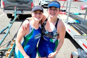 From left, Harper McGuire and Ella Schulz, members of the Olympic Peninsula Rowing Association