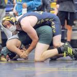 Forks Colton Duncan pinned Port Angeles Jack Harrelson in the 145-pound weight division Saturday at the Forks wrestling tournament. Duncan went on to win his weight class. (Lonnie Archibald/for Peninsula Daily News)
