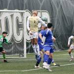 Peninsulas Christopher Dominguez just misses a header into the goal of the Edmonds Tritons. Nicolas Hernandez (9) looks on. (Dave Logan/for Peninsula Daily News)