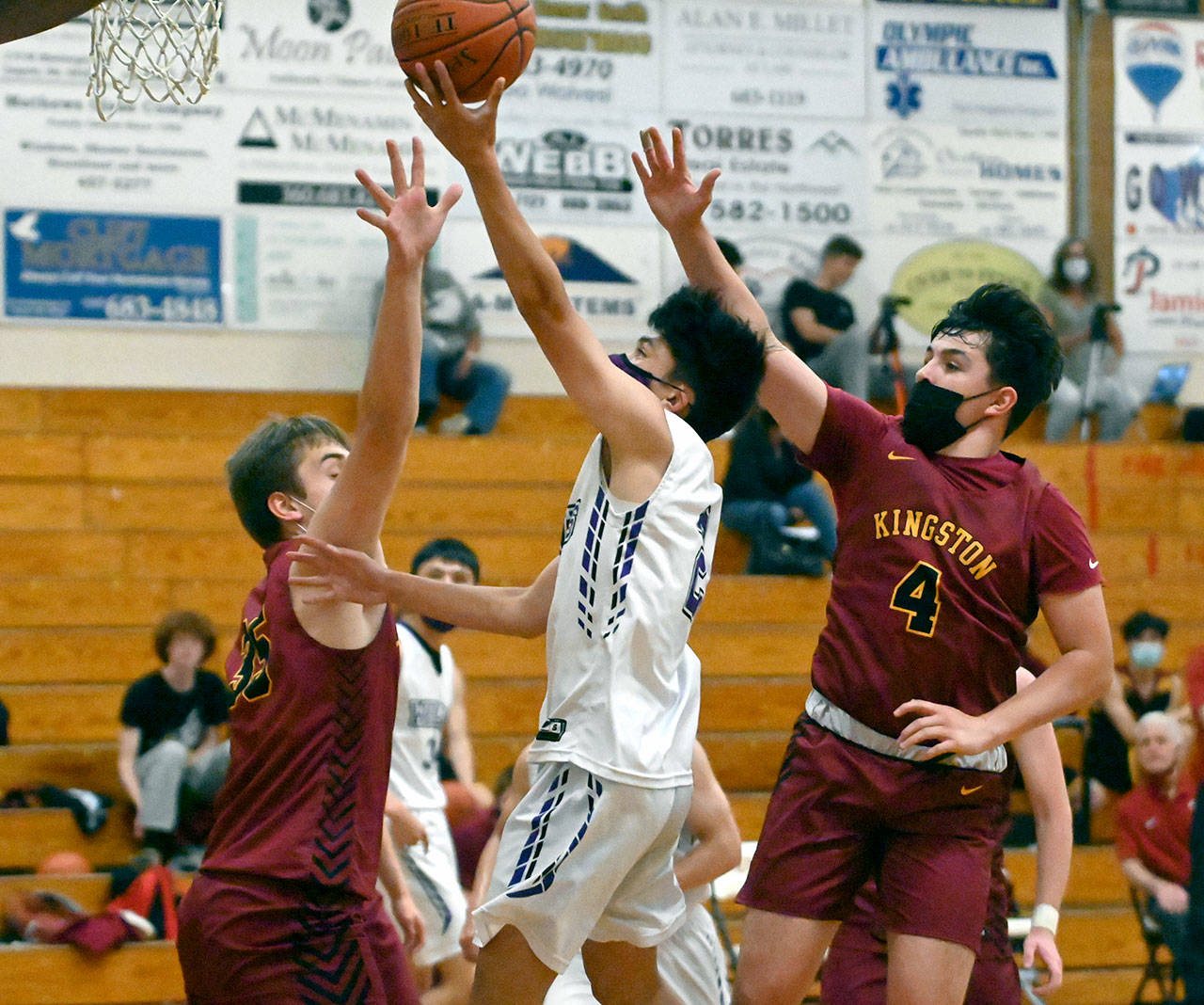 Sequim guard Kristian Mingoy drives to the basket for a score in the first half of Sequims 64-51 loss to Kingston. (Michael Dashiell/Olympic Peninsula News Group)