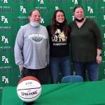 Port Angeles girls basketball coach Michael Poindexter, Jaida Wood and junior varsity coach Jennifer Rogers at Woods signing ceremony to play basketball at Pacific Lutheran University. (Pierre LaBossiere/Peninsula Daily News)