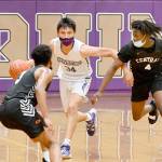 Michael Dashiell/Olympic Peninsula News Group

Sequim's Isaiah Moore dribbles between two Central Kitsap defenders during the Wolves' 72-49 loss Wednesday. Moore had 19 points and eight rebounds to lead Sequim.