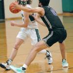 Keith Thorpe/Peninsula Daily News Port Angeles Dru Clark, left, advances the ball as North Kitsaps Johny Olmsted defends on Thursday in Port Angeles.