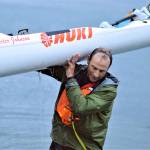 I got it, said Seventy48 winner Carter Johnson as he carried his kayak onto shore just before 5 a.m. Saturday. (Diane Urbani de la Paz/Peninsula Daily News)