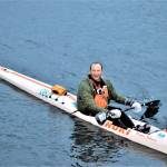At 4:54 a.m. Saturday, Carter Johnson of Underwood, Skamania County, arrived at the finish line of the Seventy48. (Diane Urbani de la Paz/Peninsula Daily News)