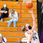 Sequim's Malory Morey goes up for a shot against Bainbridge on Saturday. Sequim won 66-17. (Michael Dashiell/Olympic Peninsula News Group)