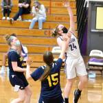 Sequims Malory Morey goes up for a shot against Bainbridge on Saturday. Sequim won 66-17. (Michael Dashiell/Olympic Peninsula News Group)