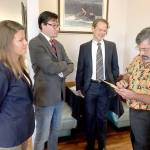 Left to right, Port Angeles City Council candidates Jena Stamper, Jason Thompson and Lindsey Schromen-Wawrin receive election forum format information from moderator Andrew May. (Paul Gottlieb/Peninsula Daily News)