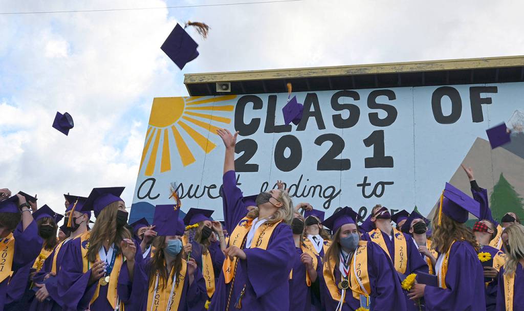 Sequim High School celebrated about 185 graduates at its commencement ceremony held Friday, June 11, at the SHS athletic field. The class of 2021, which received more than $2.6 million in scholarships and grants, heard from class-elected speaker Greta Christianson, faculty selected speaker Maddie Dietzman and its six valedictorians: Aidan Braaten, Erik Christiansen, Kensal Coudriet, Melissa Porter, Amanda Weller and Kalli Wiker. (Michael Dashiel/Olympic Peninsula News Group)