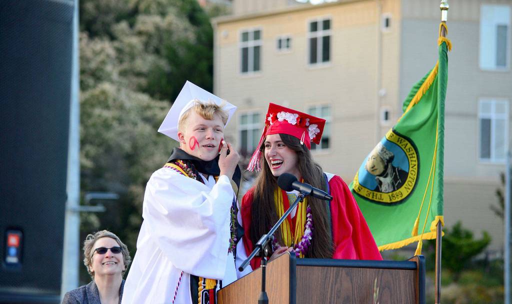 Finn ODonnell and Sorina Johnston clowned a bit for the class of 2021 during Friday nights graduation ceremonies. (Diane Urbani de la Paz/Peninsula Daily News)