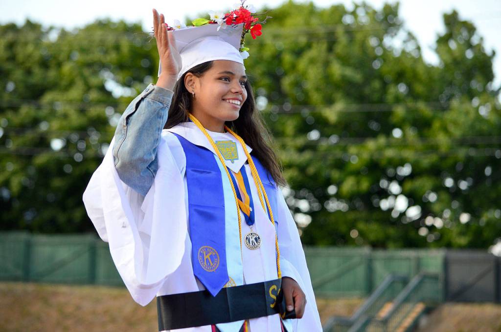Gina Brown accepted Port Townsend High Schools Andy Palmer Memorial Scholarship award during graduation ceremonies at Memorial Field on Friday night. (Diane Urbani de la Paz/Peninsula Daily News)