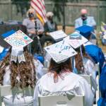 Chimacum graduating seniors display their creative side with mortar board art display during a commencement ceremony at Memorial Field in Port Townsend on Saturday. (Steve Mullensky/for Peninsula Daily News)