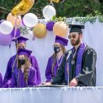Quilcene High School Valedictorian Zach Budnek gives an address to his fellow graduates during an commencement exercise Saturday at the high school. (Steve Mullensky/for Peninsula Daily News)