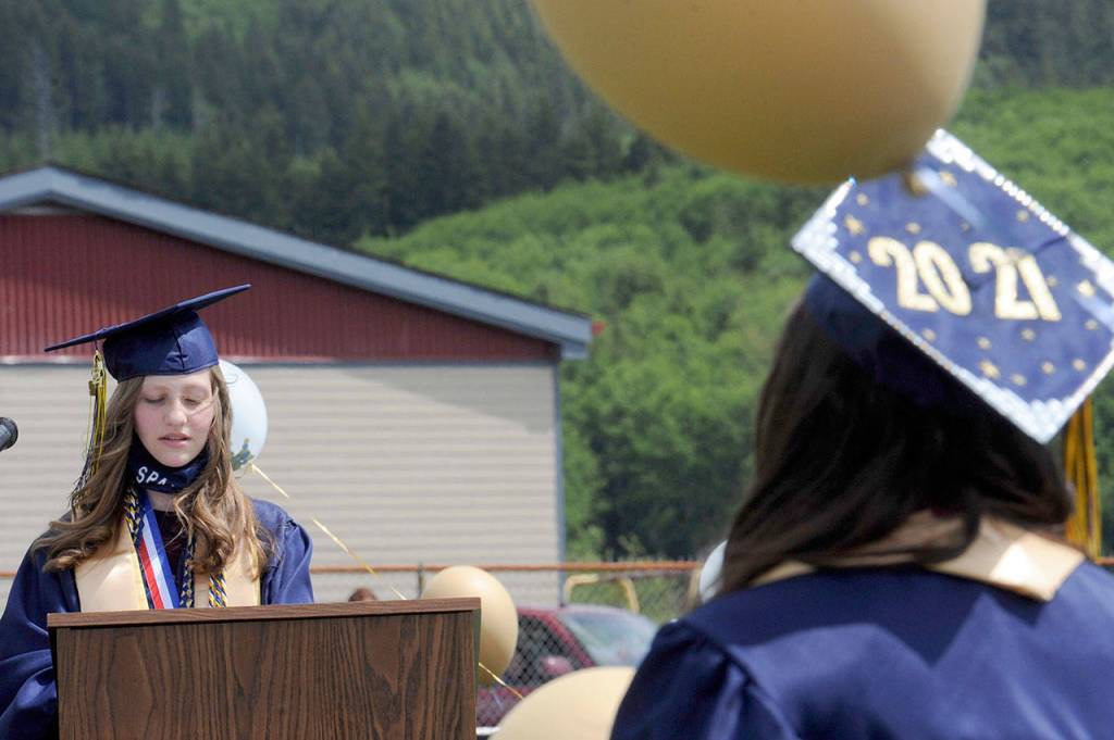 Forks High School Salutatorian Savanna Meyer gives her speech Saturday on a warm sunny day at Spartan Stadium during the 2021 Commencement Ceremony. (Lonnie Archibald/for Peninsula Daily News)