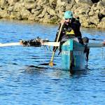 After 12 days touring Puget Sound, Andy Jacobs paddles his trimaran into the Port Townsend Boat Haven on Saturday night. (Diane Urbani de la Paz/Peninsula Daily News)