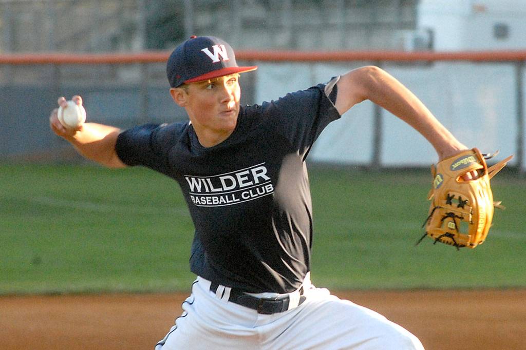 Keith Thorpe/Peninsula Daily News
Wilder pitcher Kole Acker hurls in the first inning against WBS Colts Red on Saturday night at Port Angeles Civic Field.