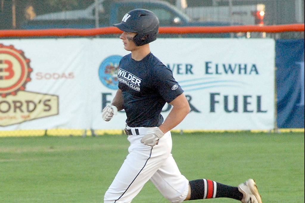 Keith Thorpe/Peninsula Daily News
Wilder's Jacob Felton rounds the bases after a first inning home run on Saturday against WBS Colts Red during the Dick Brown Memorial Firecracker Tourbnanmebt at Port Angeles Civic Field.