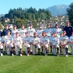 The Wilder Senior baseball club receives its championship trophy Sunday night at Civic Field after beating the Riverdogs 10-0 in the title game. Wilder went 6-0 in the Dick Brown Memorial Firecracker Classic. (Pierre LaBossiere/Peninsula Daily News)