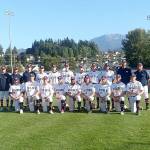 The Wilder Senior baseball club receives its championship trophy Sunday night at Civic Field after beating the Riverdogs 10-0 in the title game. Wilder went 6-0 in the Dick Brown Memorial Firecracker Classic. (Pierre LaBossiere/Peninsula Daily News)