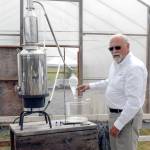 Rex Kelso, owner of Rainshadow Lavender, conducts a workshop on lavender distilling at his farm off Kitchen-Dick Road. (Keith Thorpe/Peninsula Daily News)
