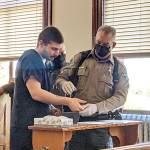 Robert John Cuevas, left, was sentenced to four years in prison on Friday after kidnapping and assaulting another Port Townsend resident last fall. (Zach Jablonski/Peninsula Daily News)