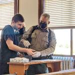 Robert John Cuevas, left, was sentenced to four years in prison on Friday after kidnapping and assaulting another Port Townsend resident last fall. (Zach Jablonski/Peninsula Daily News)