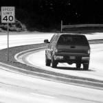 Keith Thorpe/Peninsula Daily News
A truck makes its way around a curve on a newly-divided section of U.S. Highway 101 on Saturday as the road descends into Morse Creek Valley east of Port Angeles.