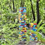 Michael Mills of Port Angeles miniature skyscrapers are among the newer pieces in the Websters Woods Sculpture Park. A guided tour of the 5-acre forest is open to the public Saturday. (Diane Urbani de la Paz/Peninsula Daily News)
