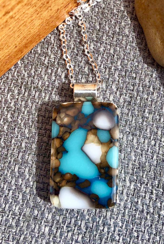 A necklace by Mara March is on display this month.