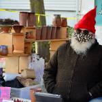 Darby Huffman of LaughinGnome Pottery, pictured at the Port Townsend Farmers Market, will welcome visitors to the new studio space he shares with partner Francie Loveall this Friday evening during the First Friday Speaker Series program. Diane Urbani de la Paz/Peninsula Daily News
